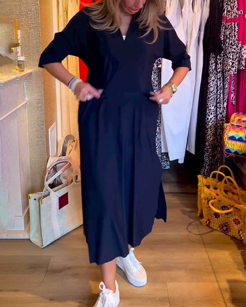Kleid mit Taschen und V-Ausschnitt