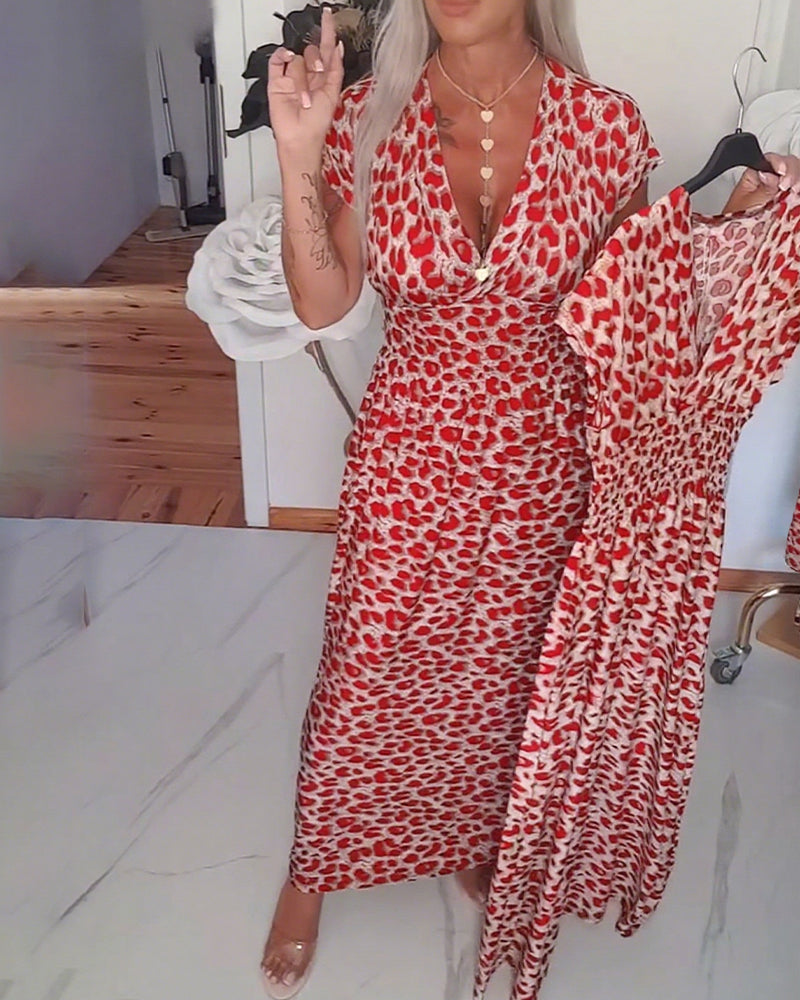 Elegantes Kleid mit Leopardenmuster und V-Ausschnitt