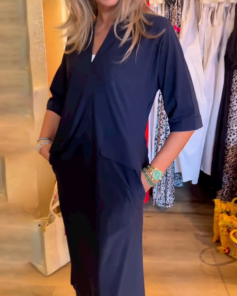 Kleid mit Taschen und V-Ausschnitt