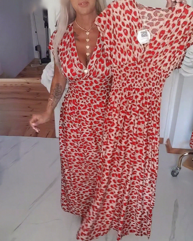 Elegantes Kleid mit Leopardenmuster und V-Ausschnitt