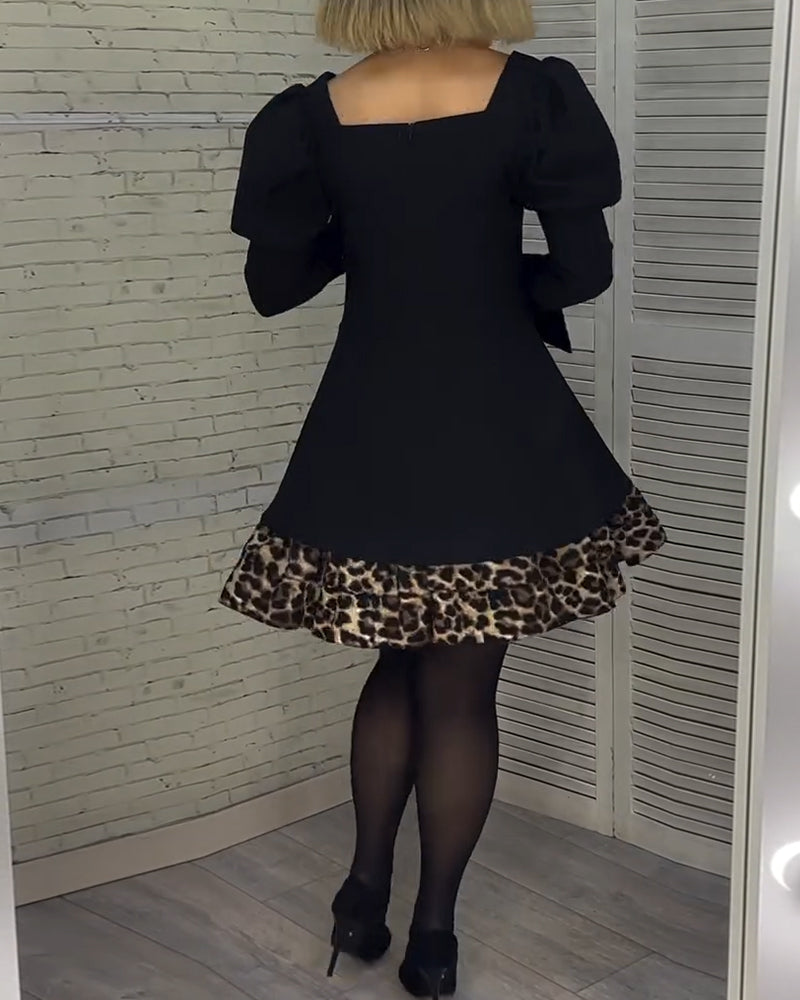 Elegantes Kleid mit Puffärmeln und Leopardenmuster