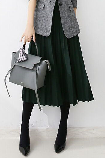 Frühherbstlicher wollener plissierter Midirock