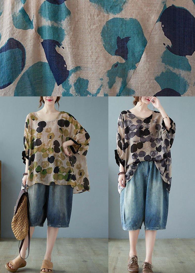 Lockeres blaues T-Shirt mit Punkten und Fledermausärmeln aus Baumwolle und Leinen