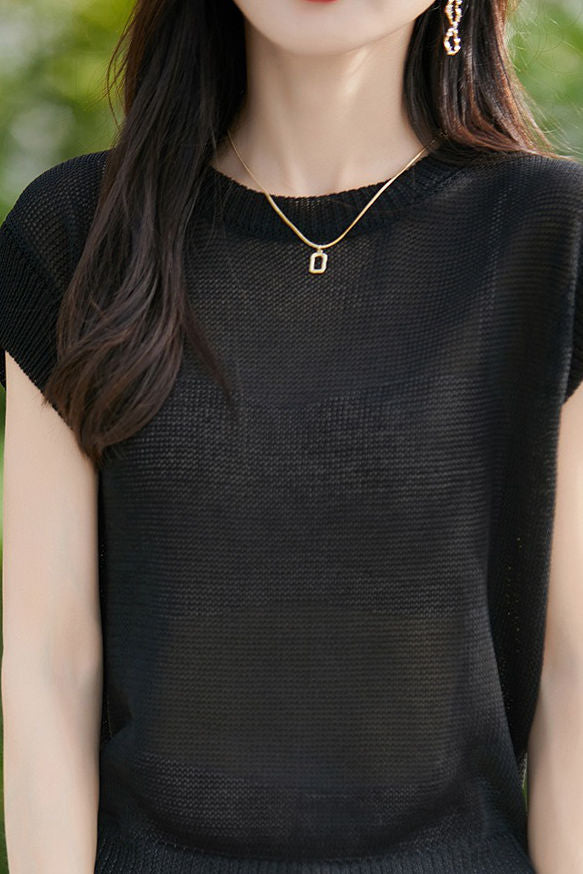 Lässiges Strickoberteil mit schwingenden Ärmeln