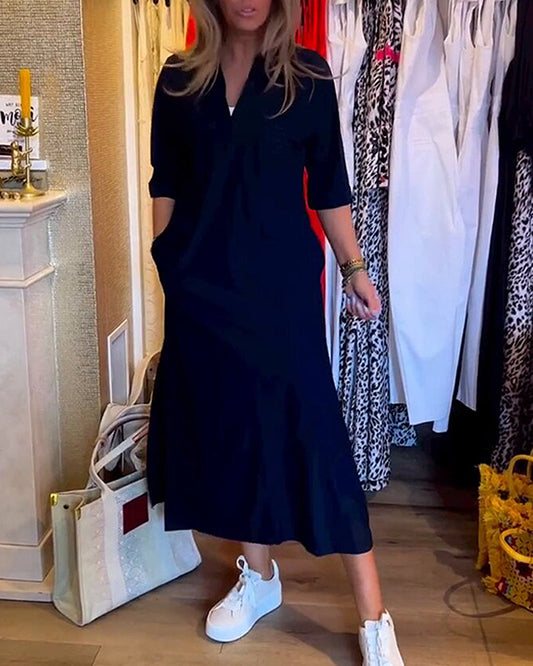Kleid mit Taschen und V-Ausschnitt